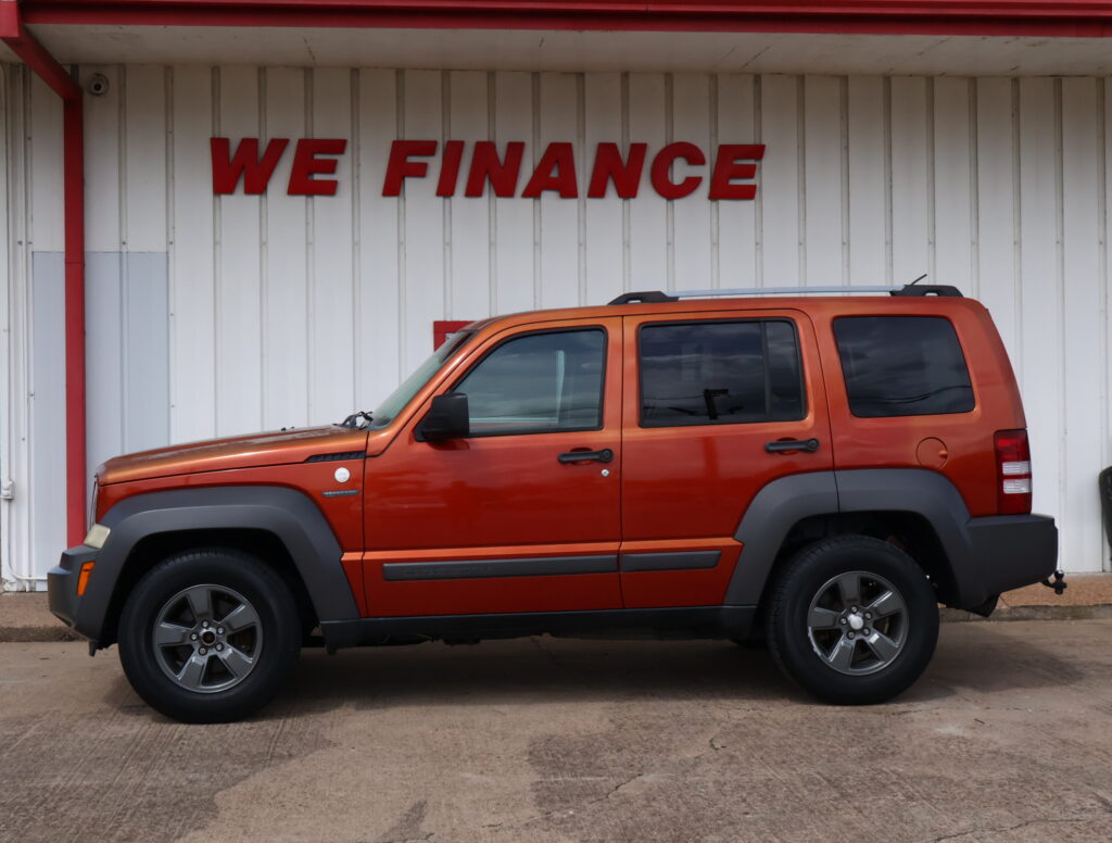 2010 ORANGE JEEP LIBERTY SUV 4-DR