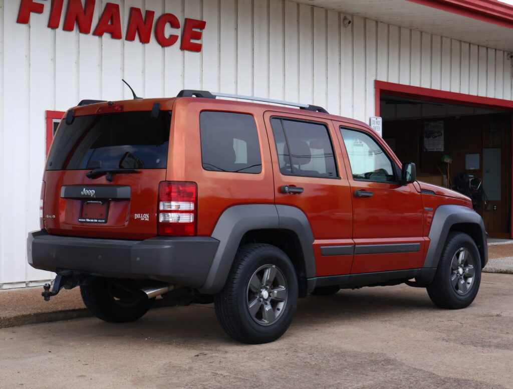 2010 ORANGE JEEP LIBERTY SUV 4-DR