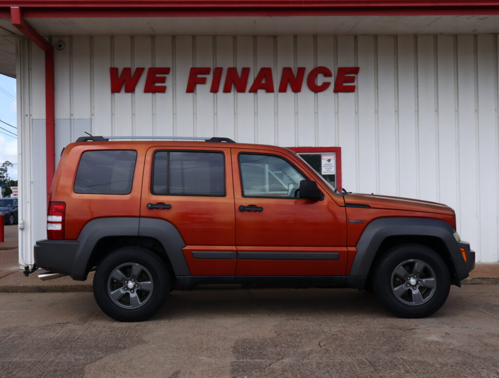 2010 ORANGE JEEP LIBERTY SUV 4-DR