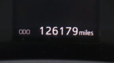 Odometer reading 126,179 miles on a dark car dashboard display